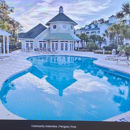 Sunset Oasis: Poolside Retreat with Patio-3
